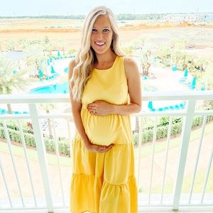 Yellow sundress that is bump friendly but it is none maternity